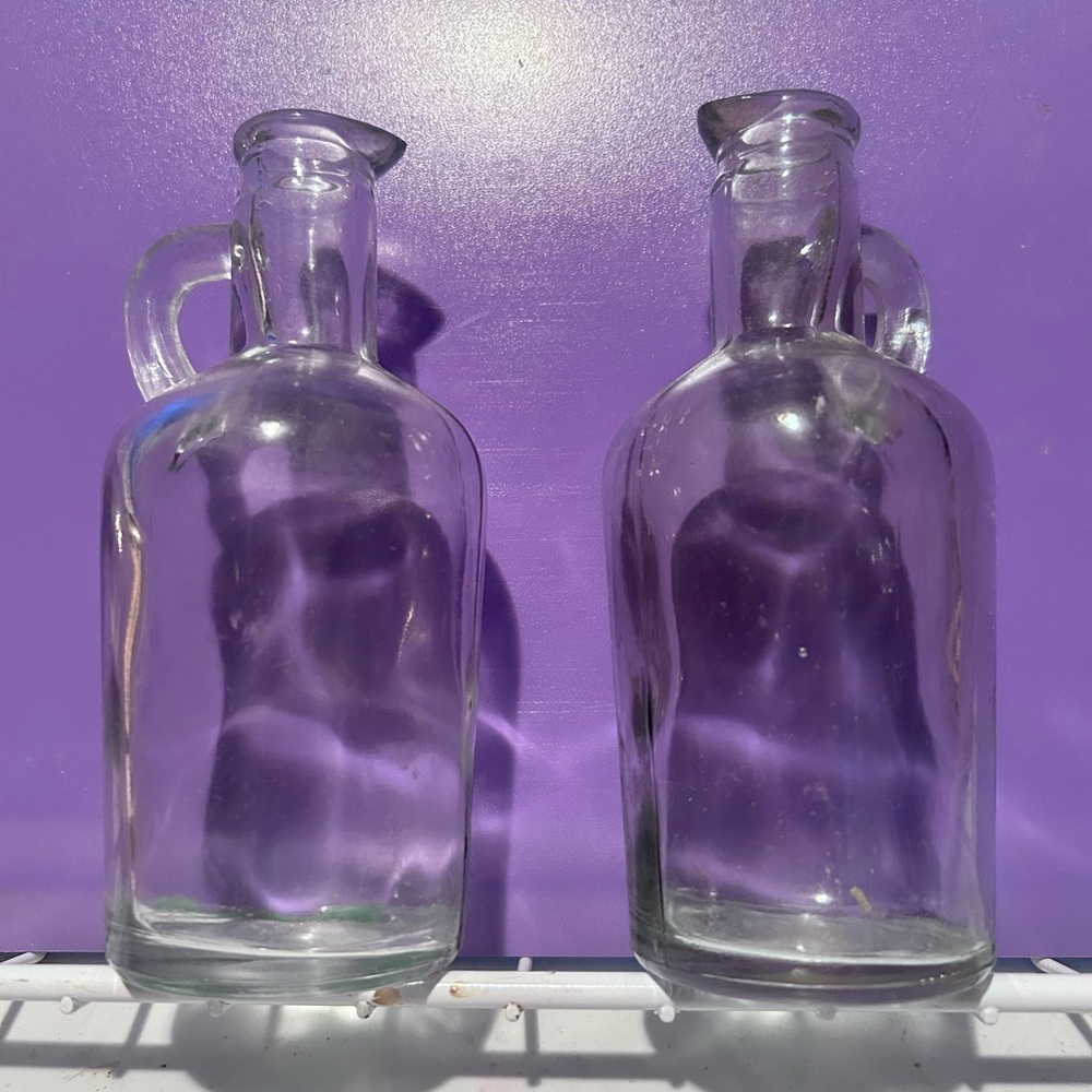 Vintage clear glass oil and vinegar bottles( missing corks)- excellent shape